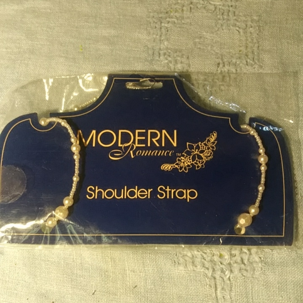 Beaded shoulder strap.